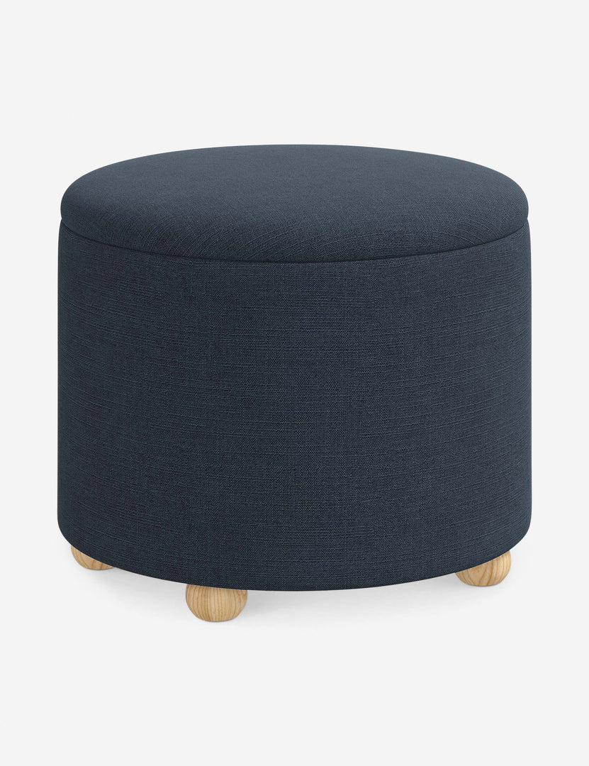 #color::navy-linen #size::24-Dia | Angled view of the Kamila Navy Linen 24-inch ottoman
