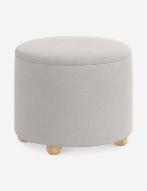 Angled view of the Kamila Mineral Gray Velvet 24-inch ottoman