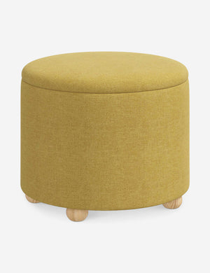 Angled view of the Kamila Golden Linen 24-inch ottoman