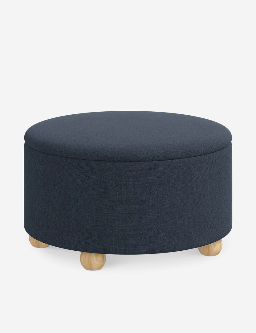 #color::navy-linen #size::34-Dia | Angled view of the Kamila Navy Linen 34-inch ottoman