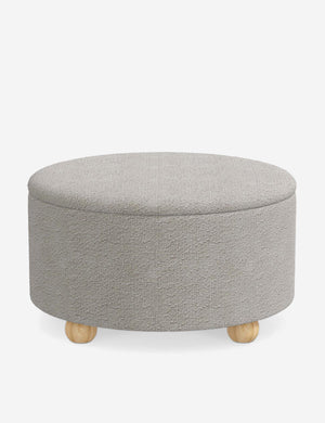 Kamila Moonlight Gray Boucle 34-inch round ottoman with storage space and pinewood feet