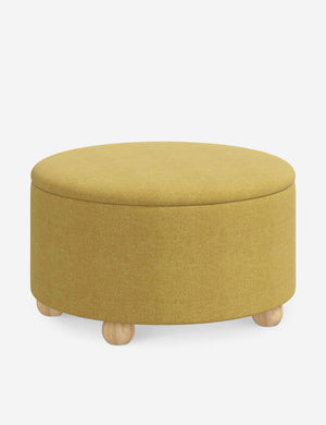 Angled view of the Kamila Golden Linen 34-inch ottoman