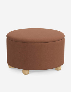 Angled view of the Kamila Terracotta Linen 34-inch ottoman