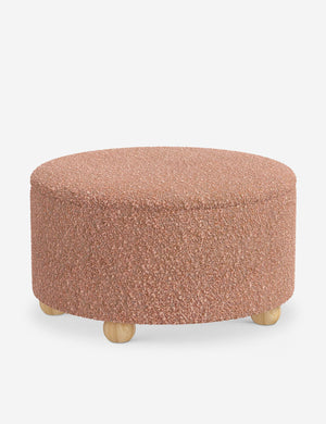 Angled view of the Kamila Blush Boucle 34-inch ottoman