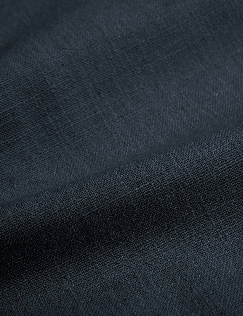 #color::navy-linen #size::cal-king #size::full #size::king #size::queen #size::twin | Detailed shot of the navy linen on the Adara navy linen upholstered bed.