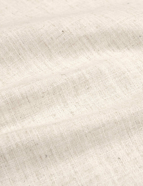 #color::talc-linen #size::cal-king #size::full #size::king #size::queen #size::twin | Detailed shot of the linen on the Adara talc linen upholstered bed.