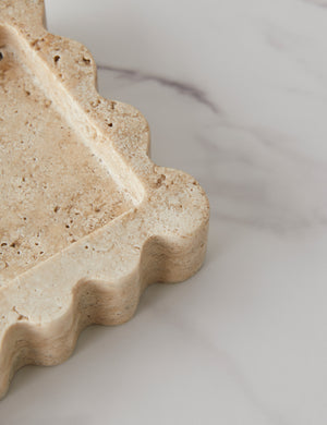 Close up corner view of the 512 long scalloped decorative tray in travertine