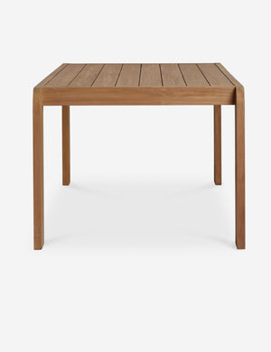 Side view of the Abbot solid teak rectangular outdoor dining table by Sarah Sherman Samuel.