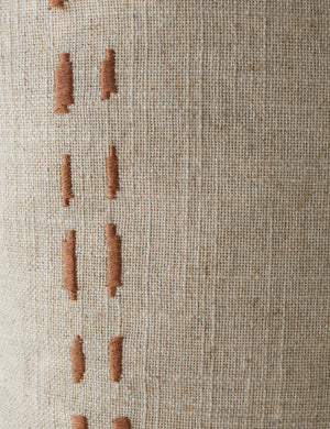 Close up of the pattern of the Accord Natural Linen Square Pillow by Elan Byrd.