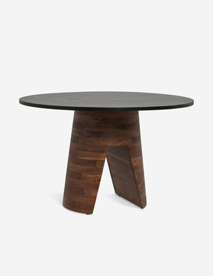 Adler acadia wooden round dining table with a wood grain texture and sculptural base