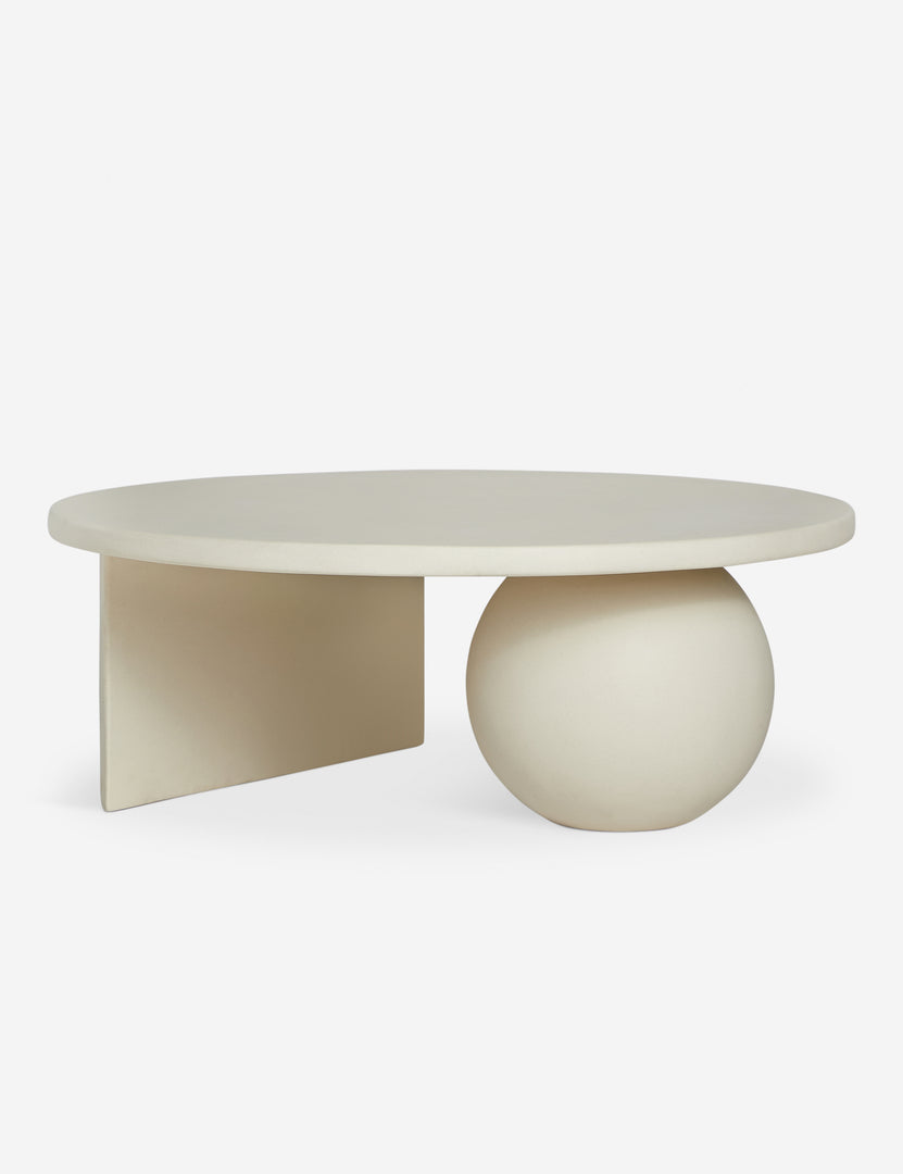 #color::ivory | Amaya round sculptural cement coffee table.