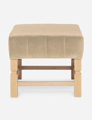 Ambleside Brie beige velvet upholstered ottoman by Ginny Macdonald with a carved frame and vertical channeling on the cushion