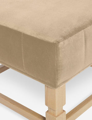 Close-up of the corner on the cushion of the Ambleside Brie beige velvet ottoman