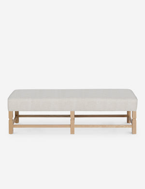 Ambleside Taupe Boucle upholstered bench with carved detailing on the frame and vertical channeling around the cushion by Ginny Macdonald