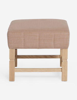 Ambleside Apricot linen upholstered ottoman by Ginny Macdonald with a carved frame and vertical channeling on the cushion