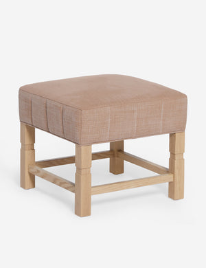 Angled view of the Ambleside Apricot linen ottoman