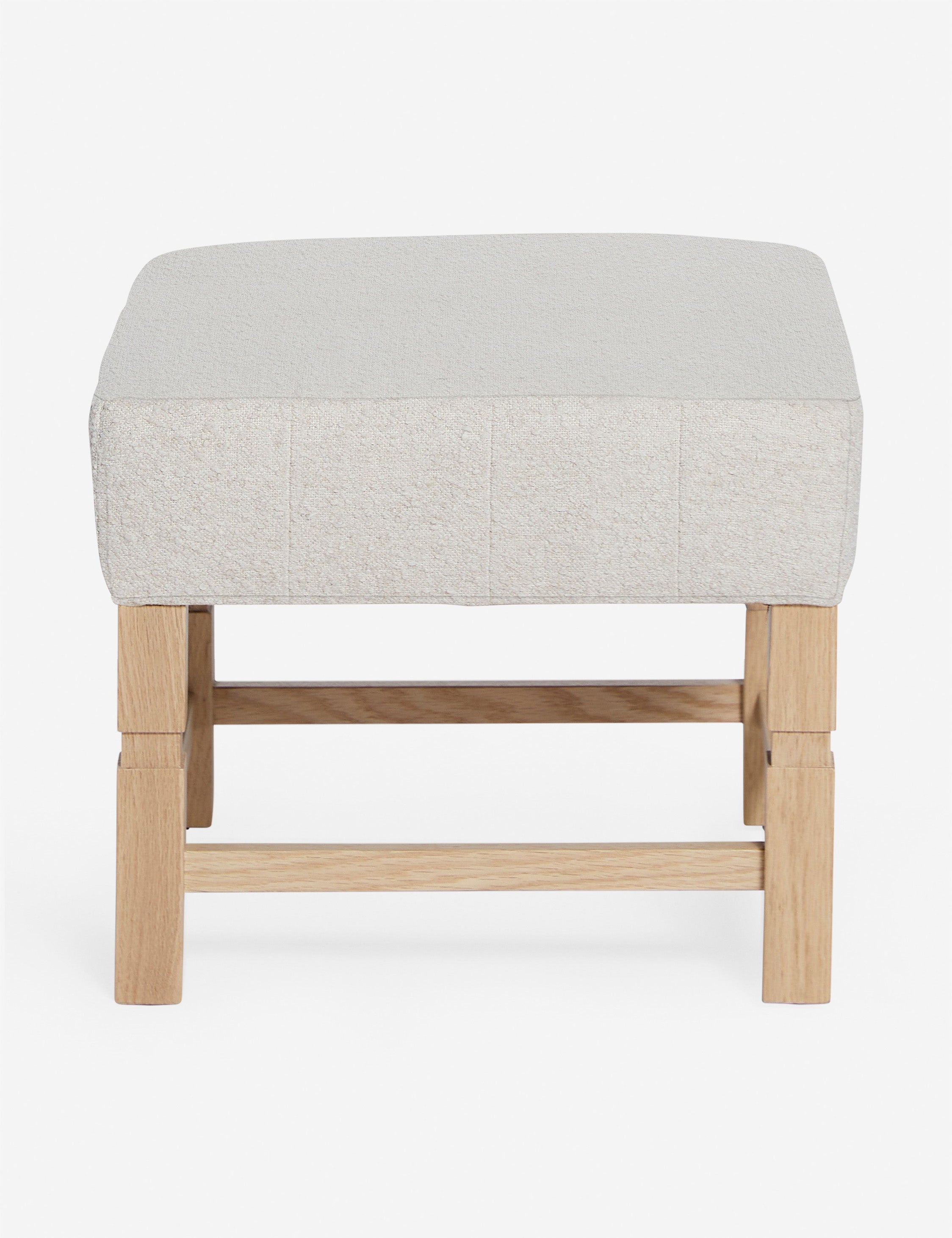 #color::taupe-boucle | Ambleside Taupe Boucle upholstered ottoman by Ginny Macdonald with a carved frame and vertical channeling on the cushion