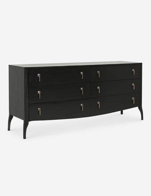 Angled view of the Anabella black wood dresser with silver drawer pulls
