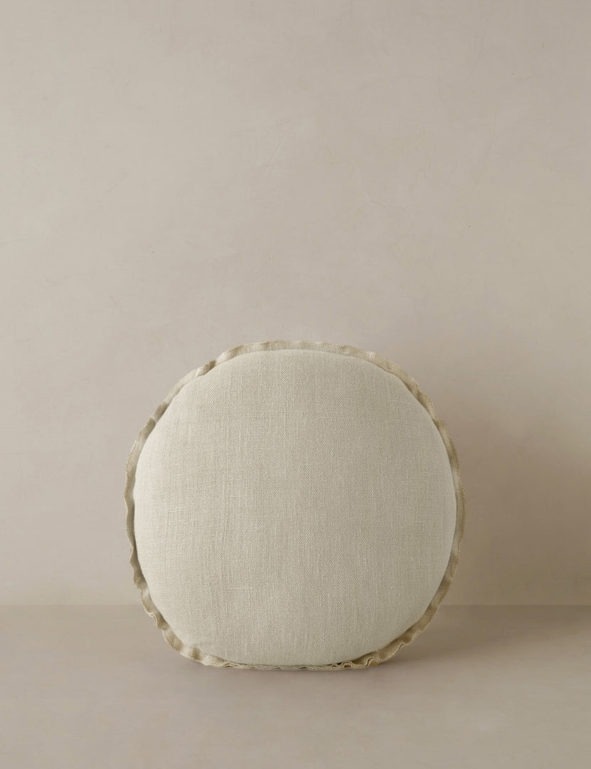 #color::light-natural | Arlo linen flange trim round pillow.