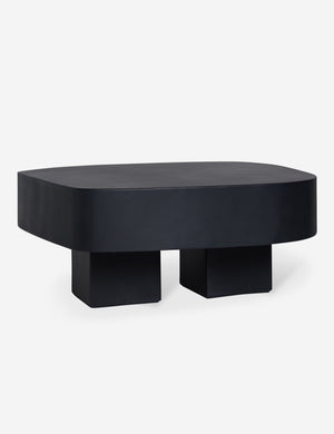 Armas black monolithic round outdoor coffee table by Sarah Sherman Samuel.