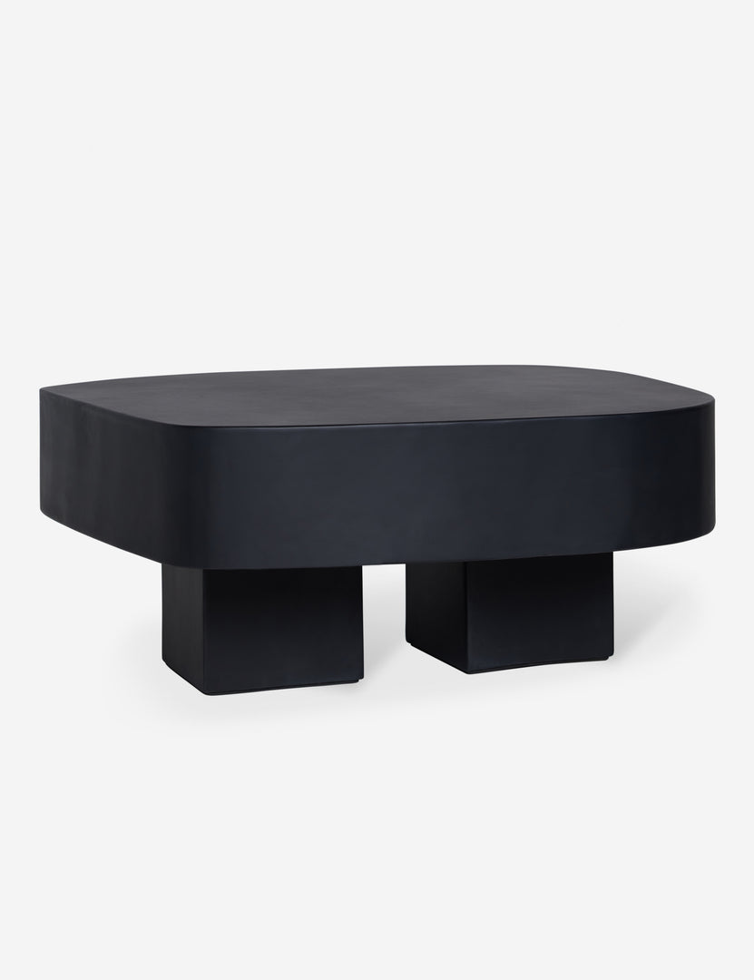 #color::black | Armas black monolithic round outdoor coffee table by Sarah Sherman Samuel.