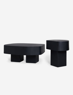 Armas black monolithic round outdoor coffee table and round side table by Sarah Sherman Samuel.