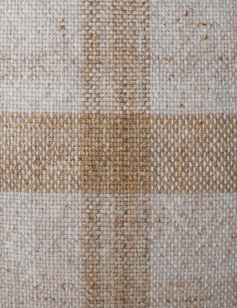#color::natural | Close up of the Atif muted plaid outdoor throw pillow in natural.