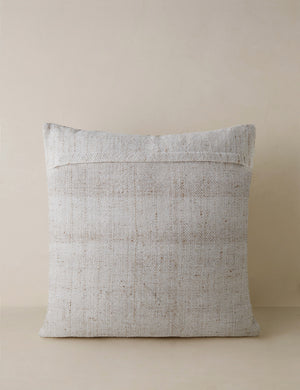 Back of the Atif muted plaid outdoor throw pillow in natural.