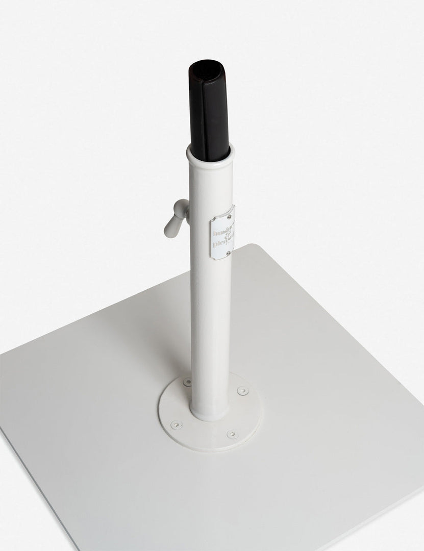 #color::white | Angled view of the  pole-insert inside the neck of the Classic white umbrella base by business and pleasure co