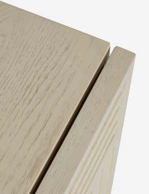 Close up of the Beck grooved light wood nightstand.