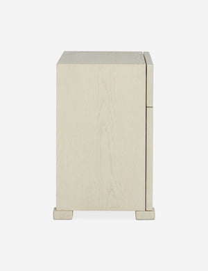 Side profile of the Back of the Beck grooved light wood nightstand.