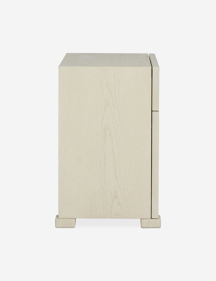 #color::light-oak | Side profile of the Back of the Beck grooved light wood nightstand.