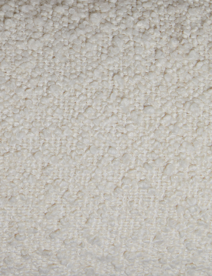#color::ivory-boucle #size::queen #size::king | Close up view of the Billow overstuffed boucle upholstered bed with wooden base