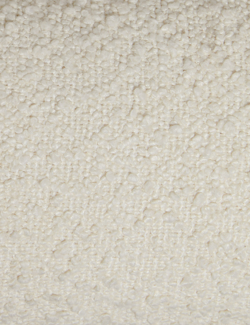 #color::ivory-boucle #size::queen #size::king | Close up view of the Billow overstuffed boucle upholstered bed with wooden base