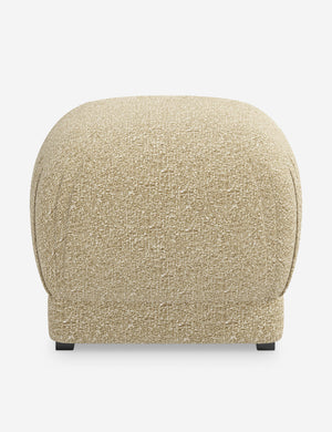 Bailee Buff Boucle upholstered ottoman with a pouf-like design and pleated corners
