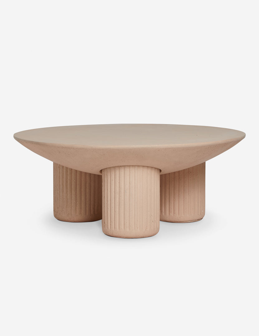#color::terracotta | Carr modern round fluted base coffee table.
