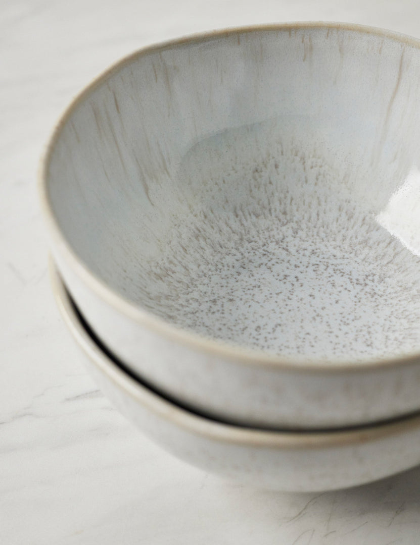 #color::sand #style::cereal-bowls--set-of-6 | Detailed view of the speckles and striations on the inside of the Eivissa set of 6 shiny white glazed stoneware cereal bowls by Casafina