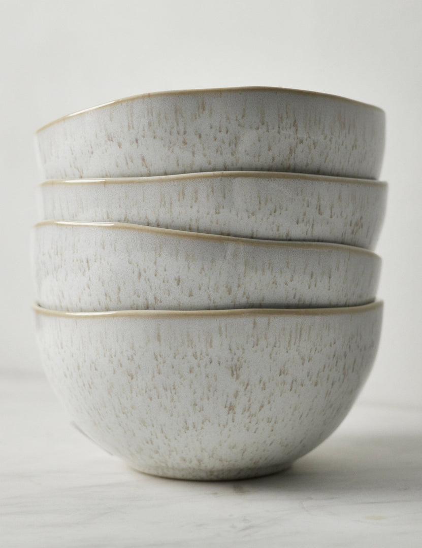#color::sand #style::cereal-bowls--set-of-6 | Side view of the Eivissa set of 6 shiny white glazed speckled stoneware cereal bowls by Casafina