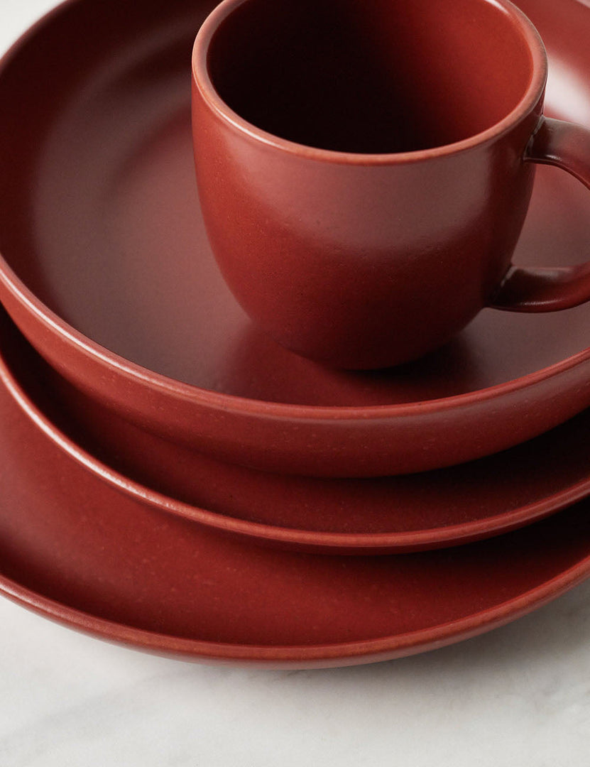 #color::cayenne #style::5-piece-set | Angled view of the Pacifica cayenne red Dinnerware 5-Piece Place Setting by Casafina