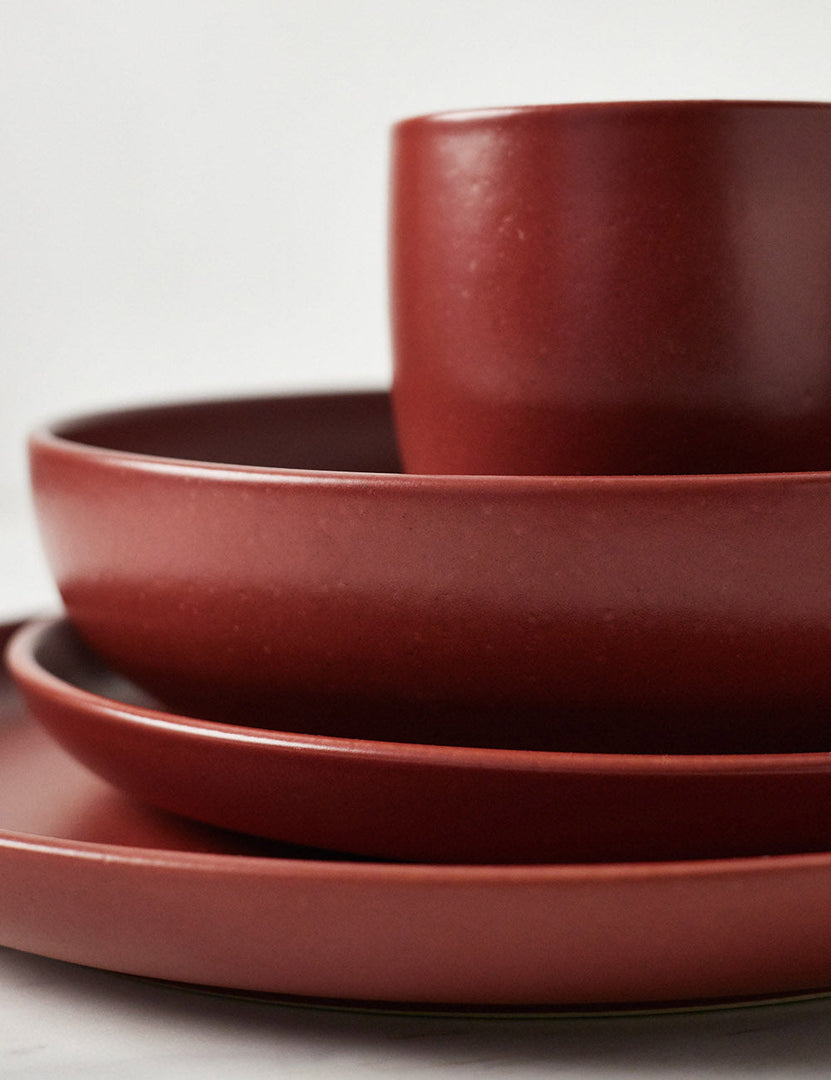 #color::cayenne #style::5-piece-set | Close-up of the Pacifica cayenne red Dinnerware 5-Piece Place Setting by Casafina