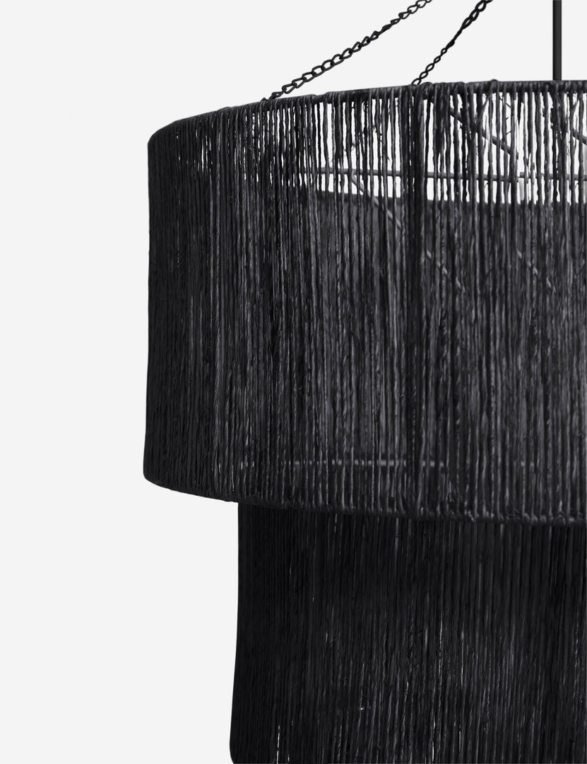 | Close-up of the right side of the Chavette three-tiered black jute-wrapped chandelier