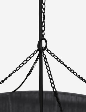 Close-up of the chained hanging attachment on the Chavette three-tiered black jute-wrapped chandelier