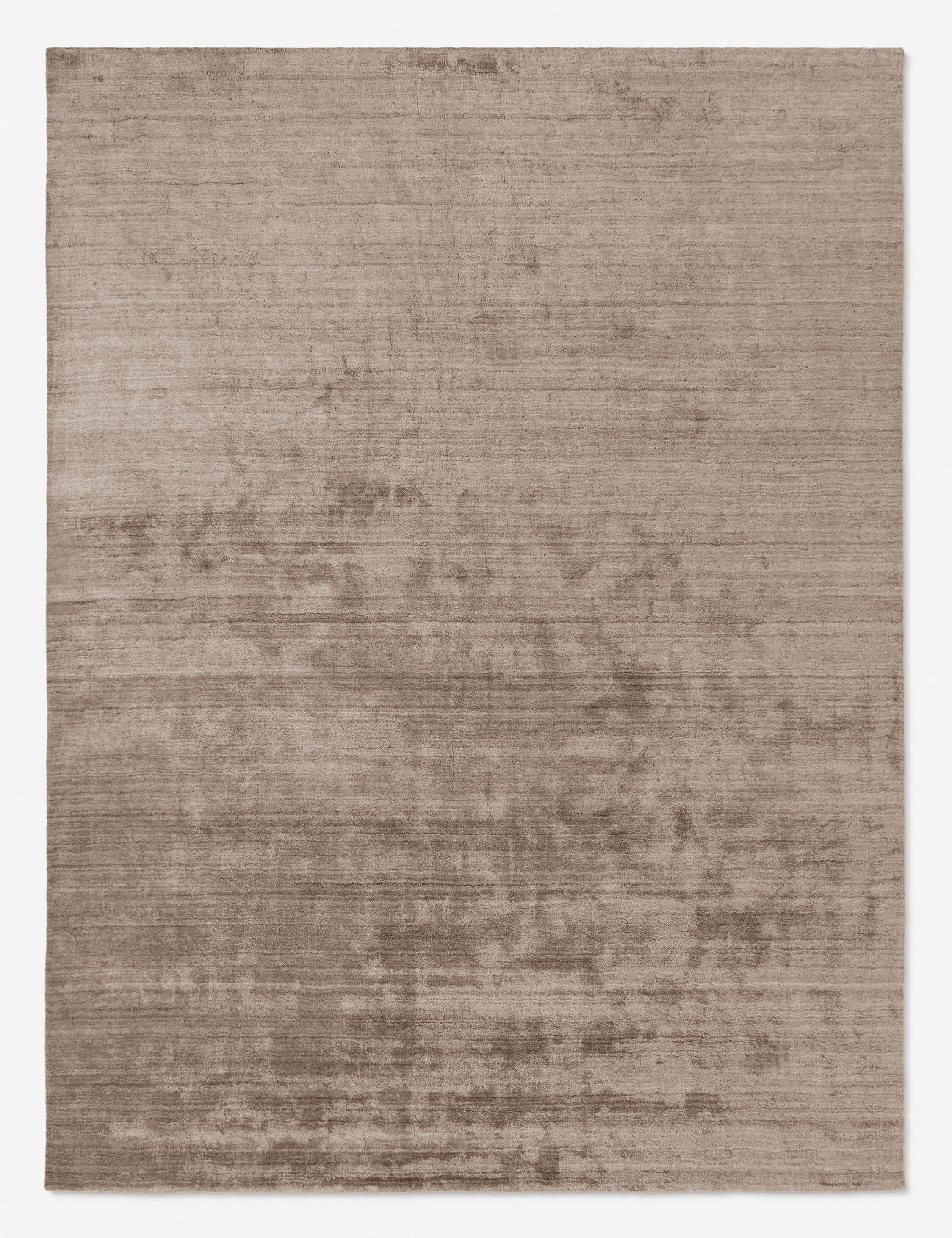 #color::sand-dune #size::6--x-9- #size::8--x-10- #size::9--x-12- #size::10--x-14- #size::12--x-15- #size::6--round #size::8--round | Chiltern hand-loomed viscose rug by Jake Arnold