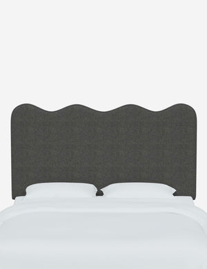 Clementine Charcoal Linen Headboard with a scalloped shape at the top