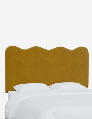 Angled view of the Clementine Citronella Velvet Headboard