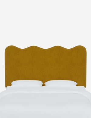 Clementine Citronella Velvet Headboard with a scalloped shape at the top
