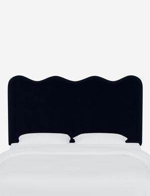 Clementine Navy Velvet Headboard with a scalloped shape at the top