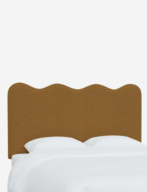 Angled view of the Clementine Ochre Boucle Headboard