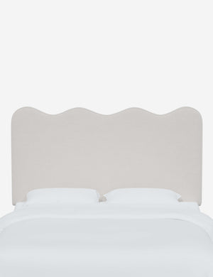 Clementine Snow Velvet Headboard with a scalloped shape at the top