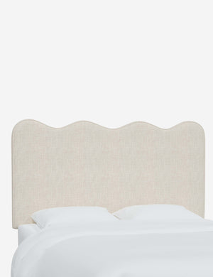 Angled view of the Clementine Talc Linen Headboard